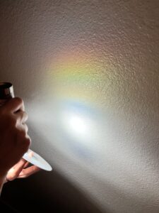 How to make a rainbow using a flashlight and CD