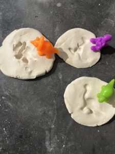 three dinosaur fossil STEAM activity