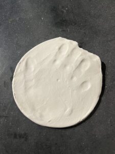 Handprint in clay